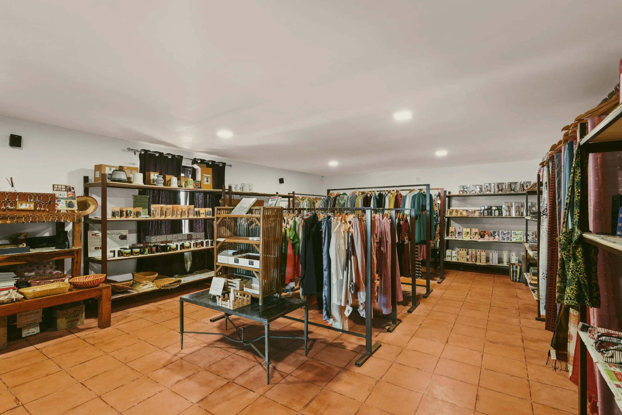 Locally made clothing and keepsakes displayed in the Red Earth shop