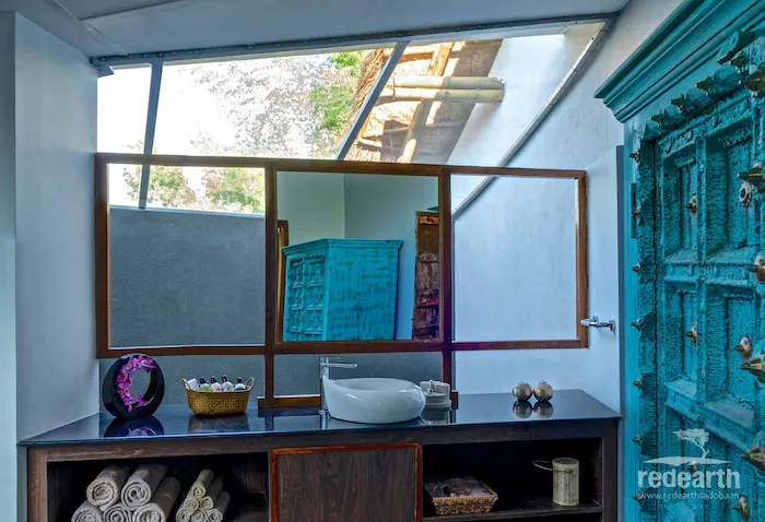 A cottage vanity made with reclaimed blue timber