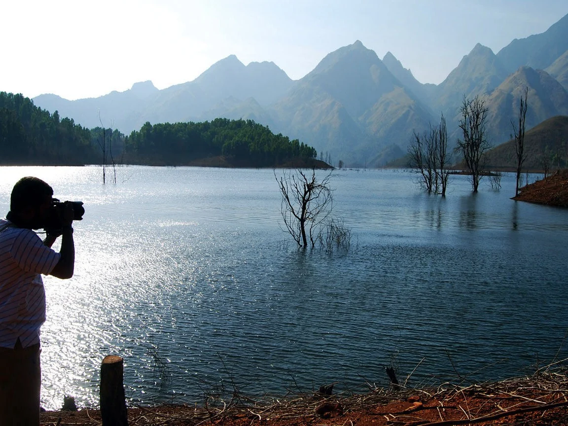 Still water and mountain ridges in the Wayanad landscape