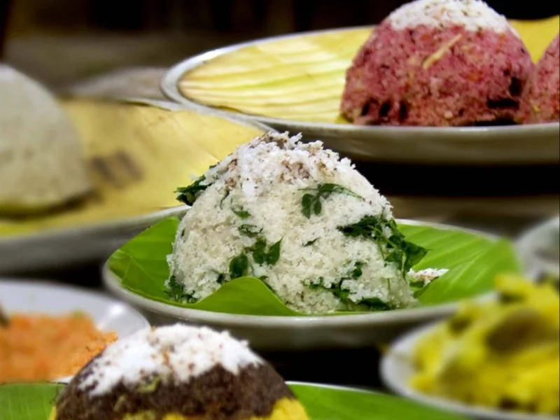 Fresh puttu served with regional accompaniments